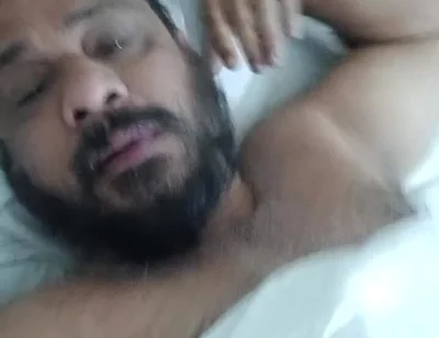 Indian Daddy Lying on the Bed Teasing and Posing for You