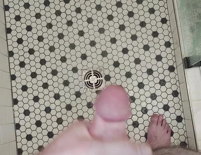 Standing in a Shower Stall Rubbing One Out