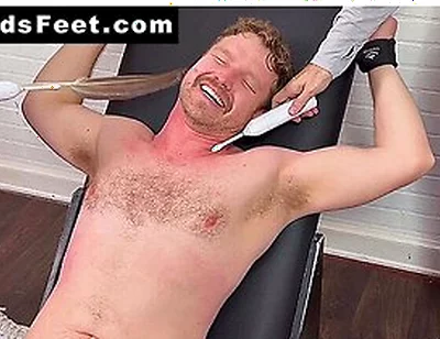 Russ Laughs Hard While His Doms Dan And Girth Tickle His Big Feet