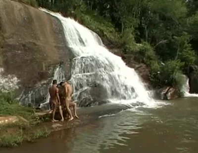 Three Nude in the River