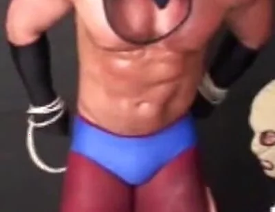 Superhero Stripped & Man Handled