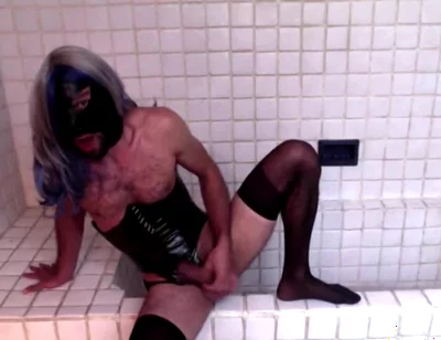 Latex Masked Sissy in Pvc Corset Cums Hard on Stockings and Heels
