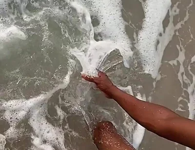 Having Fun on the Beach of Cotonou Alone for the First Time
