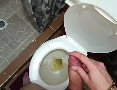 Two Shots of Cum on the Pee in the Bathroom