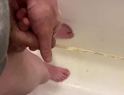 Amateur Boy Pissing, with Close-up and Good Quality Slow Motion of the Load of Pee Coming Out of the Pee-hole (urethra)