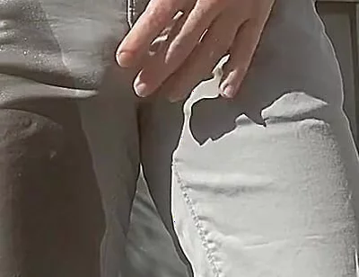 Jules Wets His Grey Pants and Exposes His Semi-hard Cock Through His Trousers