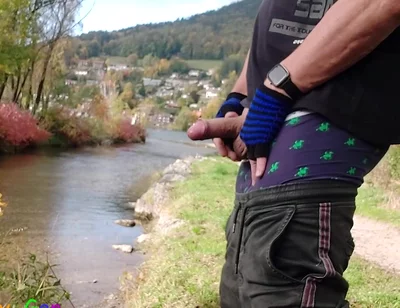 A Gay Emo Guy Jerks off His Thick Cock at Lake Tegernsee and Ejaculates His Semen Into Nature.