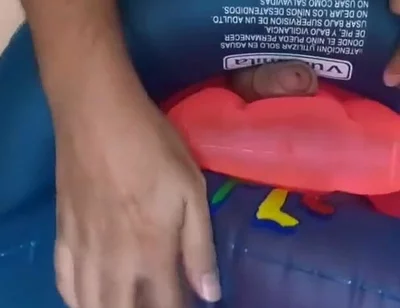 Playing with inflatable swim ring