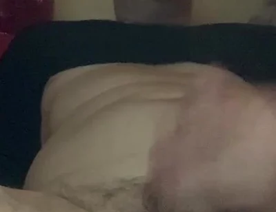 Masturbating