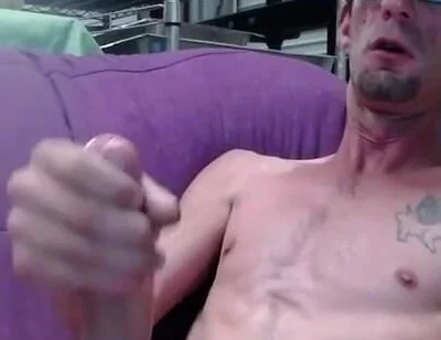 Masturbating