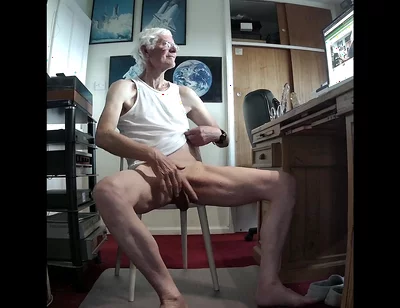 Low Angle Strip with Close up Cum Shot on Web Cam
