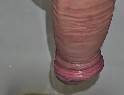 Male Peeing Into the Toilet