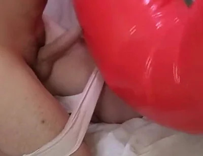 Playing with Red Swimring Pool Toy