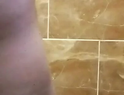 Some Scenes of Cutting Hair in the Toilet with the Door Closed
