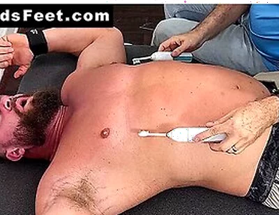 Restrained Girth Gets A Taste Of Non Stop Feet And Body Tickles