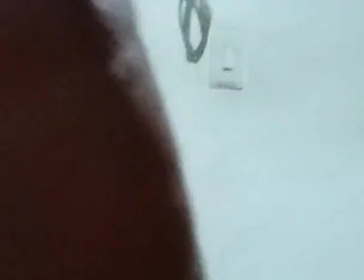Spilling milk while my neighbor stares out the window