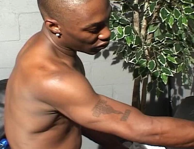 Tattooed Black Man Spanks and Bangs a Dude with Tight Asshole in Bareback Style