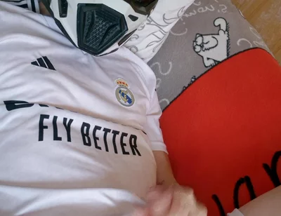 The Guy Is Wearing a Soccer Uniform and Mxhelmet with a Morning Cum