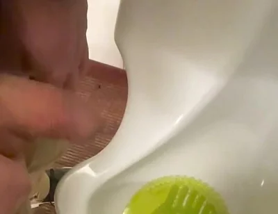 Amateur Redhead Guy Caught Pissing in a Public Toilet's Urinal - He Then Quickly Plays with His Cock Before Leaving