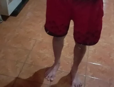 Boy in Red Shorts