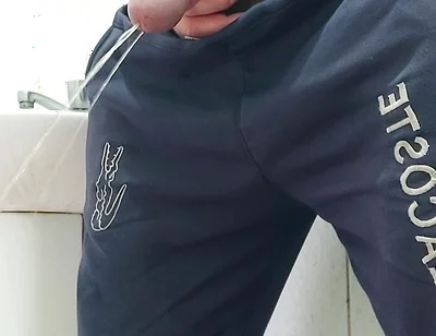 A Well-endowed Brazilian Man Urinating and Showing His Thick Penis to His Female Friends.