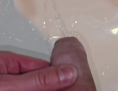 Pissing to the Bathroom Sink