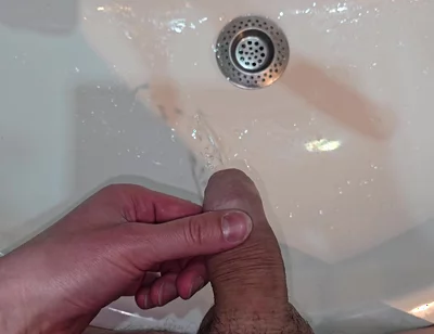 Pissing to the Bathroom Sink
