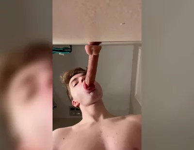 Cock Hungry Twink Slobbers on Giant Dildo!
