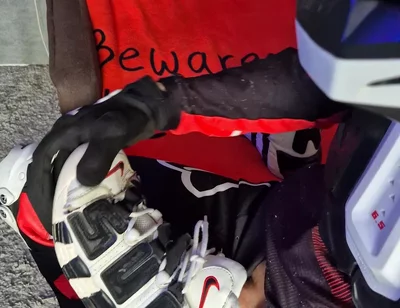 An Excited Guy in Motorcycle Gear Fucks His Sneakers