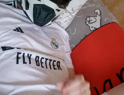 The Guy Is Wearing a Soccer Uniform and Mxhelmet with a Morning Cum