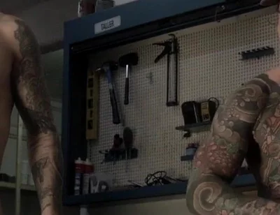 Two Friends in the Mechanic's Workshop