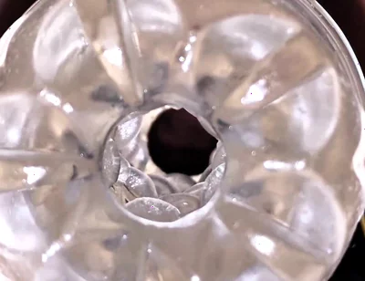 Close-up Cock in Tool for Masturbate Orgasm on Flash