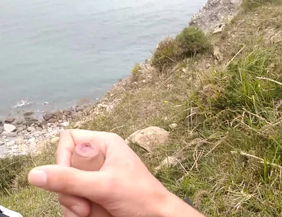Big Beautiful Big Fat Cock Gets Handjob on the Beach with Gorgeous Sea Views