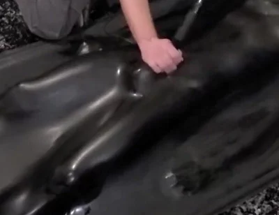 Cute twink tormented in latex vacbed