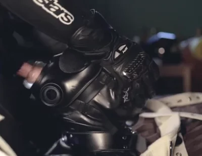 Rubber boy sucking biker master cock