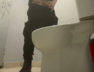 Amateur Friends Pissing Together in the Club's Toilets