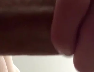 Masturbating