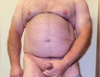 Anal Steve in His Blue Thong Showing off His Bear Body and Cock, with a Cock Ring on and Showing His Massive Butt Plug