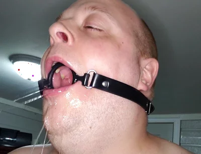 Deepthroating a 7 Inch Dildo with Mouth Gag Ring