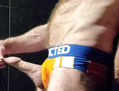 Muscle Bear Showing off His Uncut Cock