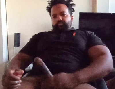 Thick Mixed Latino Bear Jacks off to Porn