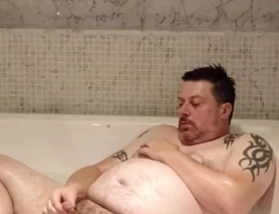 In the Big Bath Having a Wank