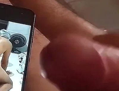 Ladysilva Masturbating Her Hot Cock Watching Her Video on Her Cell Phone