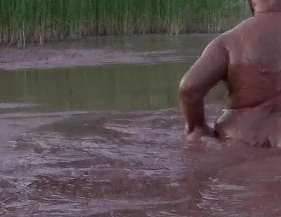 Mud Bath in Deep Quarry Mud Pond