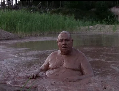 Mud Bath in Deep Quarry Mud Pond