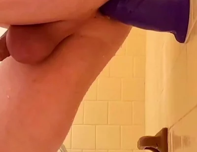 Dildo That Is Purple. Bathroom Anal Massage
