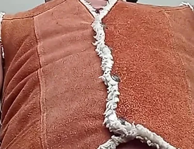 Kennie Jai Jerks in a Suede Vest