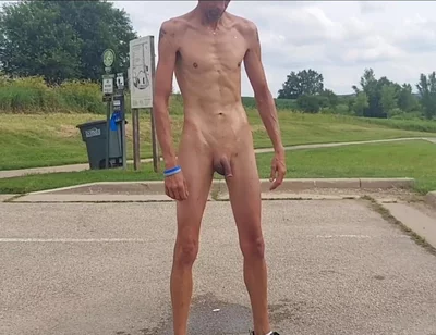 Naked and Pissing in Parking Lot