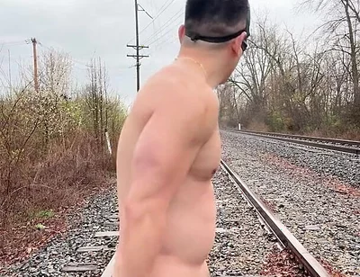 Rain-soaked Asian Muscle God in Jockstrap Bounces Pecs, Shows V-taper & Eats His Massive Load on Train Tracks