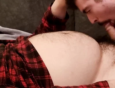 Sucking off a Hairy Bear on the Sofa